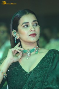 Telugu Actress Komalee Prasad in a green saree attending HIT 2 pre-release function