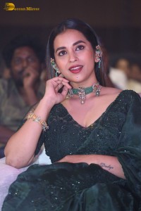 Telugu Actress Komalee Prasad in a green saree attending HIT 2 pre-release function