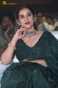 Telugu Actress Komalee Prasad in a green saree attending HIT 2 pre-release function