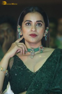 Telugu Actress Komalee Prasad in a green saree attending HIT 2 pre-release function