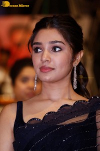 Actress Krithi Shetty in a black saree