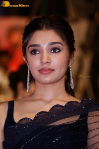 Actress Krithi Shetty in a black saree