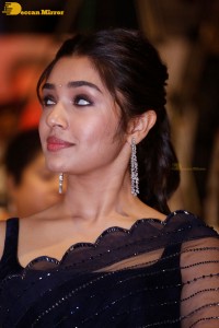 Actress Krithi Shetty in a black saree