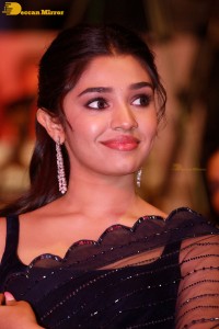 Actress Krithi Shetty in a black saree