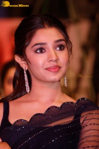 Actress Krithi Shetty in a black saree