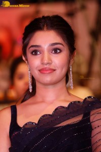 Actress Krithi Shetty in a black saree