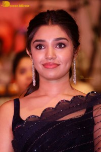 Actress Krithi Shetty in a black saree