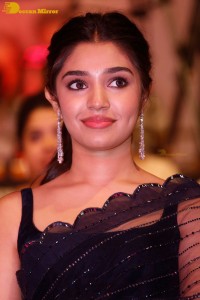 Actress Krithi Shetty in a black saree