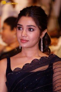 Actress Krithi Shetty in a black saree