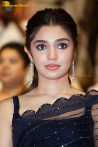 Actress Krithi Shetty in a black saree