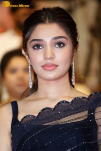 Actress Krithi Shetty in a black saree