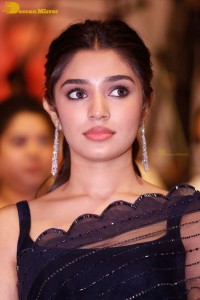 Actress Krithi Shetty in a black saree