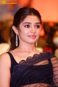 Actress Krithi Shetty in a black saree