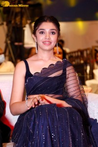 Actress Krithi Shetty in a black saree