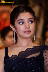 Actress Krithi Shetty in a black saree