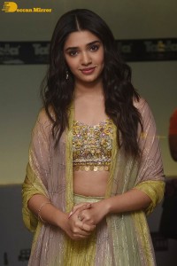 Telugu Actress Krithi Shetty in a green dress