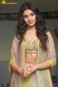 Telugu Actress Krithi Shetty in a green dress