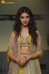 Telugu Actress Krithi Shetty in a green dress