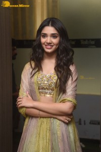 Telugu Actress Krithi Shetty in a green dress