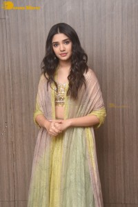 Telugu Actress Krithi Shetty in a green dress