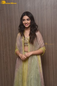 Telugu Actress Krithi Shetty in a green dress