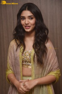 Telugu Actress Krithi Shetty in a green dress