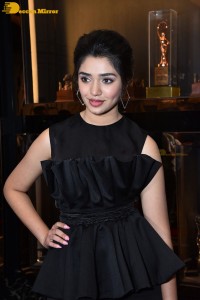 Krithi Shetty in a black dress