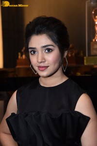 Krithi Shetty in a black dress