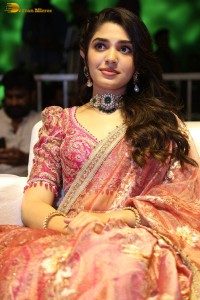 actress krithi shetty in a red lehenga choli dress