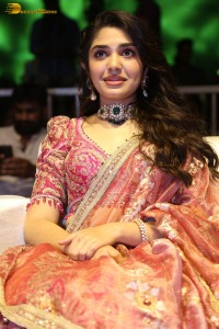 actress krithi shetty in a red lehenga choli dress