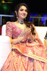 actress krithi shetty in a red lehenga choli dress