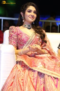 actress krithi shetty in a red lehenga choli dress