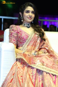 actress krithi shetty in a red lehenga choli dress