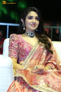 actress krithi shetty in a red lehenga choli dress