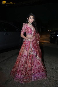 actress krithi shetty in a red lehenga choli dress