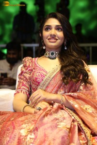 actress krithi shetty in a red lehenga choli dress