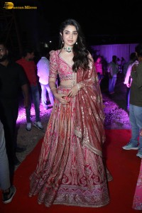 actress krithi shetty in a red lehenga choli dress