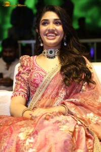 actress krithi shetty in a red lehenga choli dress