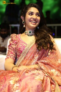 actress krithi shetty in a red lehenga choli dress