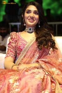 actress krithi shetty in a red lehenga choli dress