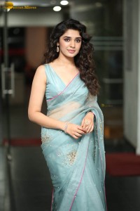 Indian actress krithi shetty beautiful in a blue saree while attending an event