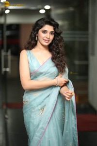 Indian actress krithi shetty beautiful in a blue saree while attending an event