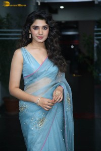 Indian actress krithi shetty beautiful in a blue saree while attending an event