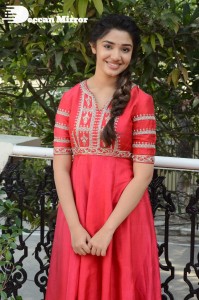 Actress Krithi Shetty in a red color salwar dress