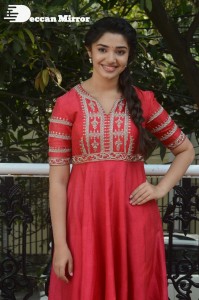 Actress Krithi Shetty in a red color salwar dress