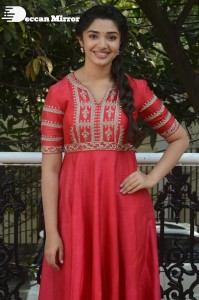 Actress Krithi Shetty in a red color salwar dress
