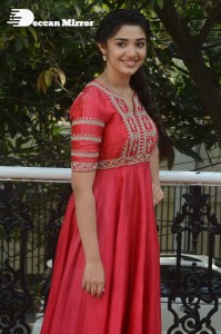 Actress Krithi Shetty in a red color salwar dress