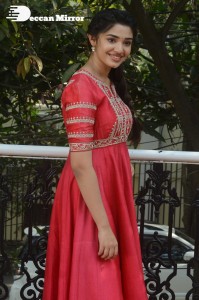 Actress Krithi Shetty in a red color salwar dress