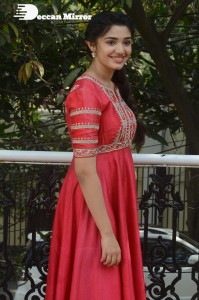 Actress Krithi Shetty in a red color salwar dress