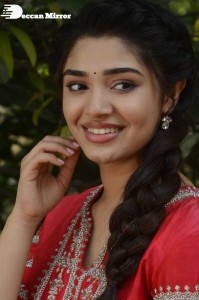 Actress Krithi Shetty in a red color salwar dress